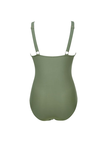 O terno de malha com decote em V esculpido